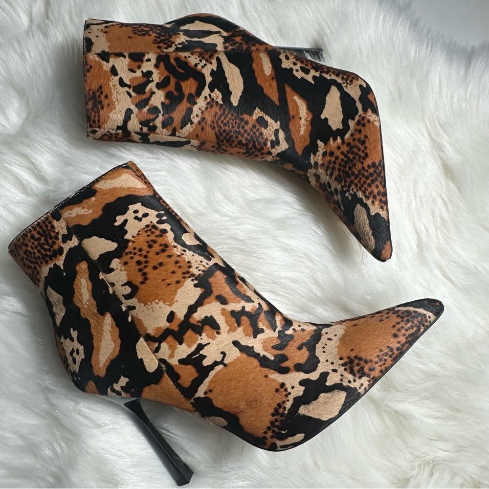 ASOS Brown and Black Heeled Boots with Sleek Design